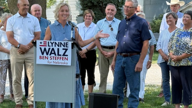 Former State Sen. Lynne Walz of Fremont, the Democratic nominee for Nebraska governor (at podium) announces her pick of Humboldt farmer Ben Steffen as her choice for lieutenant governor on Tuesday, July 28, 2026, on a farm north of Elkhorn.
(Zach Wendling / Nebraska Examiner)