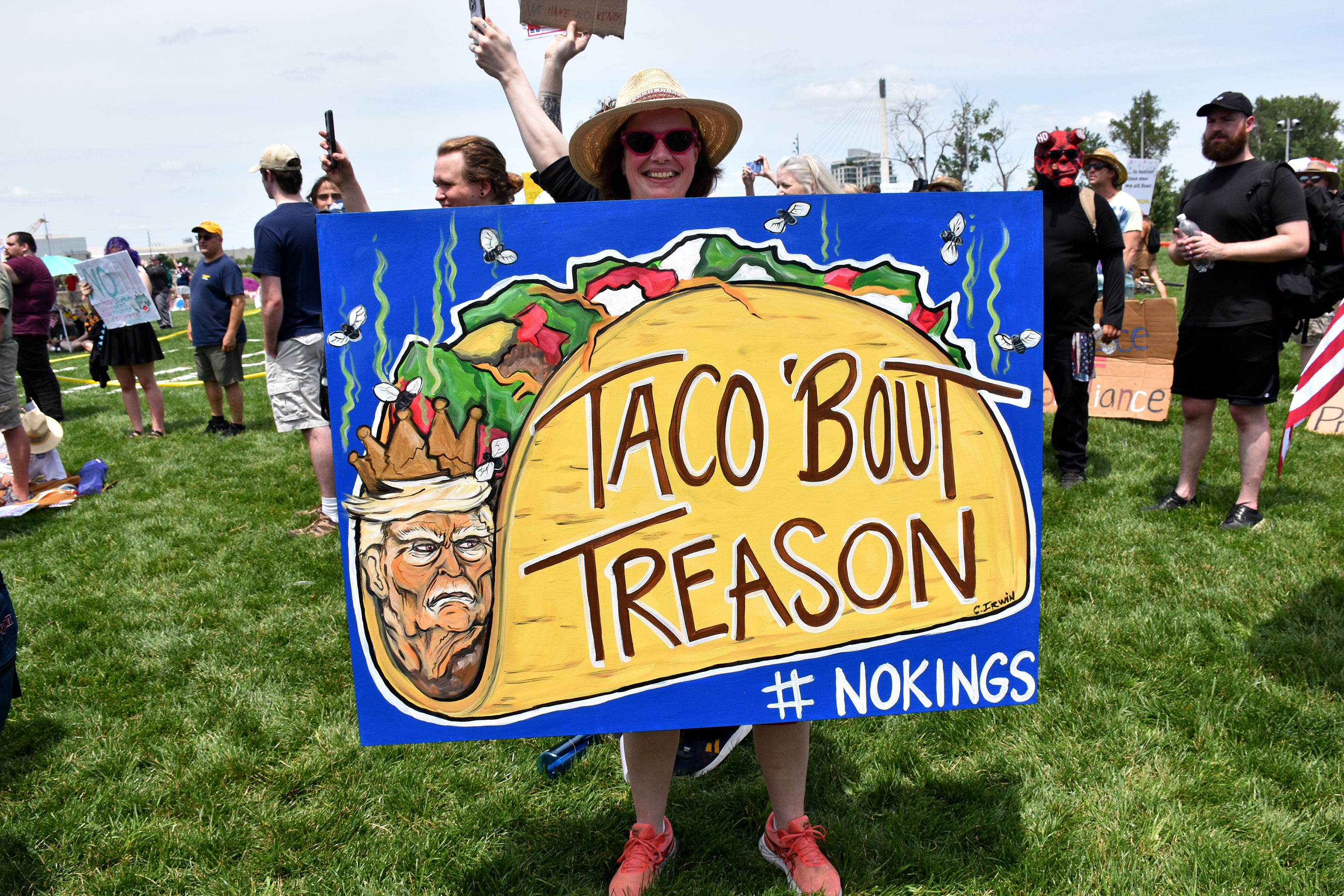 A sign being held at the ‘No Kings’ protest in Tom Hanafan River’s Edge Park on June 14, 2025 in Council Bluffs, Iowa.<br />(Carla Chance / The Daily Record)
