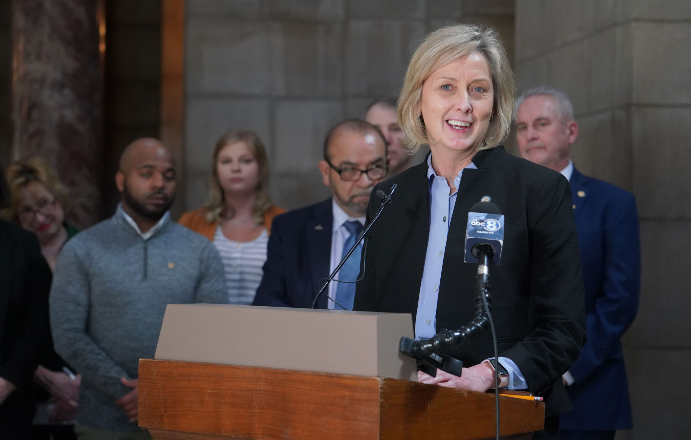 State Sen. Lynne Walz of Fremont, center, leads a news conference in the Nebraska Capitol Rotunda, March 16, 2022.<br />(Zach Wendling / Nebraska News Service)